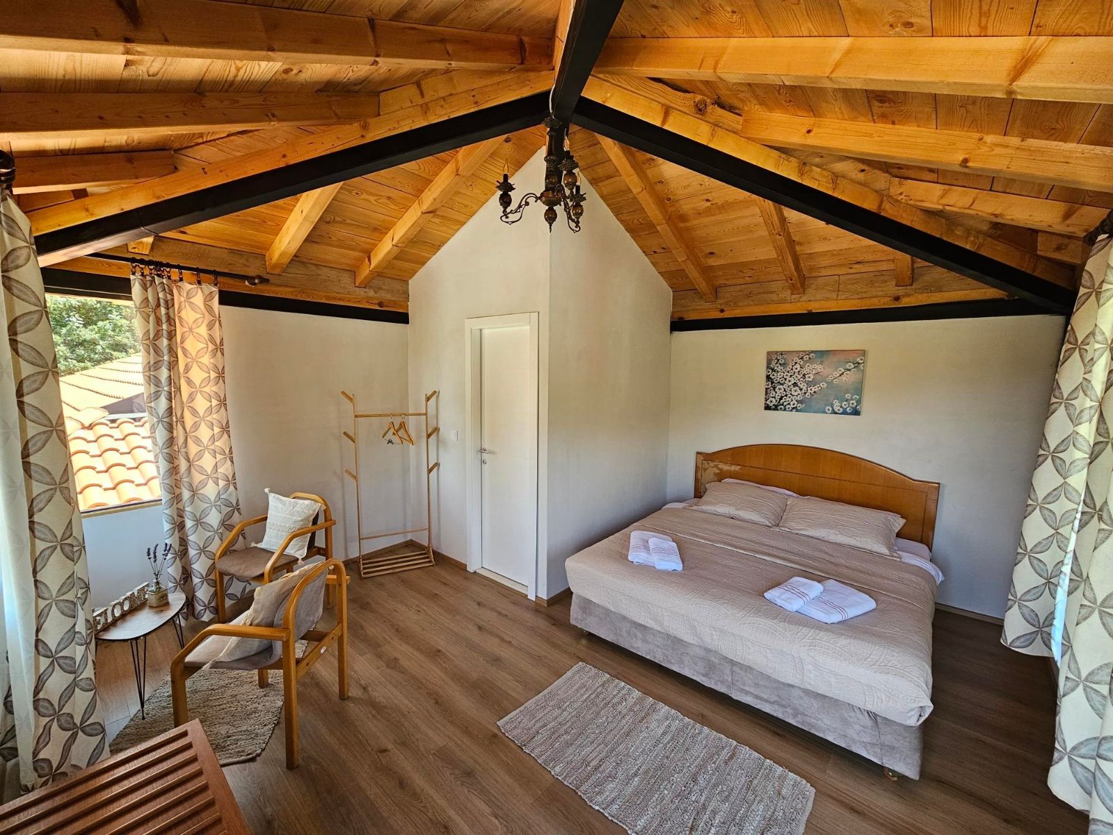 Double room at Chateau Orman with stone details